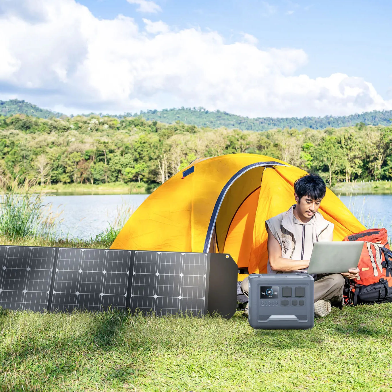 A traveler using a Rinecopo portable solar generator and foldable solar panels to power a laptop while camping by a lake. This off-grid energy solution is perfect for digital nomads, outdoor enthusiasts, and emergency backup power, ensuring clean energy anywhere