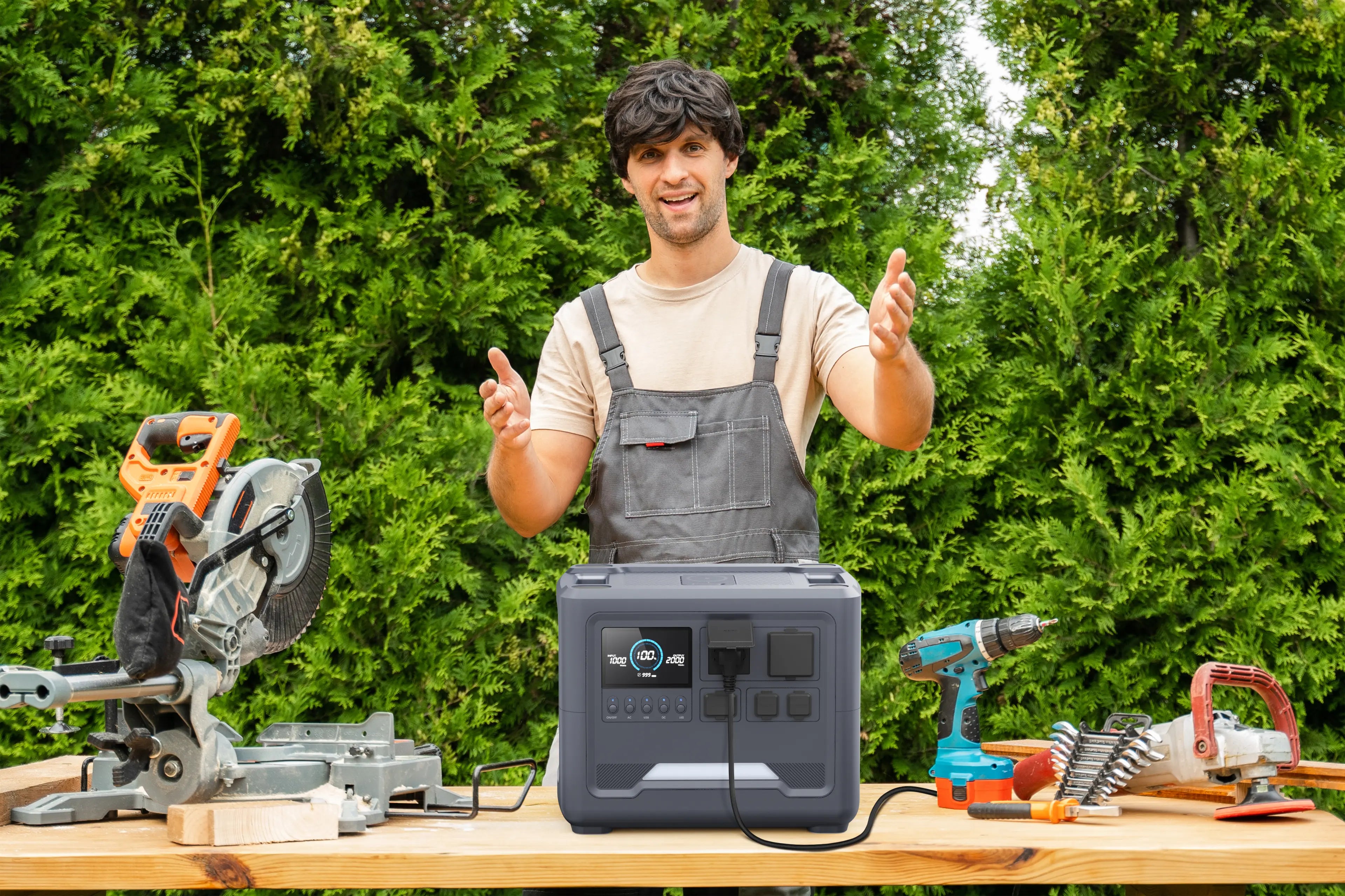 A DIY enthusiast showcasing a Rinecopo high-capacity portable power station powering multiple heavy-duty electric tools, including a miter saw and power drill. This reliable energy hub with high pure sine wave AC output is perfect for home improvement, outdoor construction, and professional woodworking projects