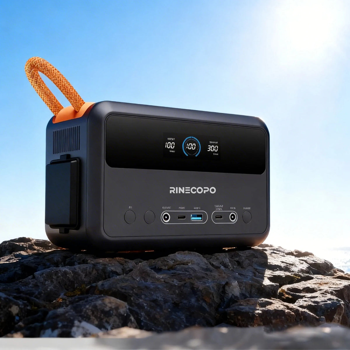 RINECOPO compact 300W power generator sitting on rugged rocks under the sun, delivering reliable on-the-go electricity for diverse daily and outdoor needs