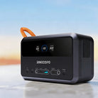 RINECOPO 300W portable power station resting outdoors by the water, perfectly sized for minivans and ready for dual charging via car or solar panels to eliminate power anxiety.